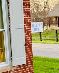 This is the sign on the edge of the building and we might not of driven past it the first time if we had known to look for it.