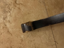 Table leg in travel path.