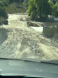 The “dirt road” up to the property.