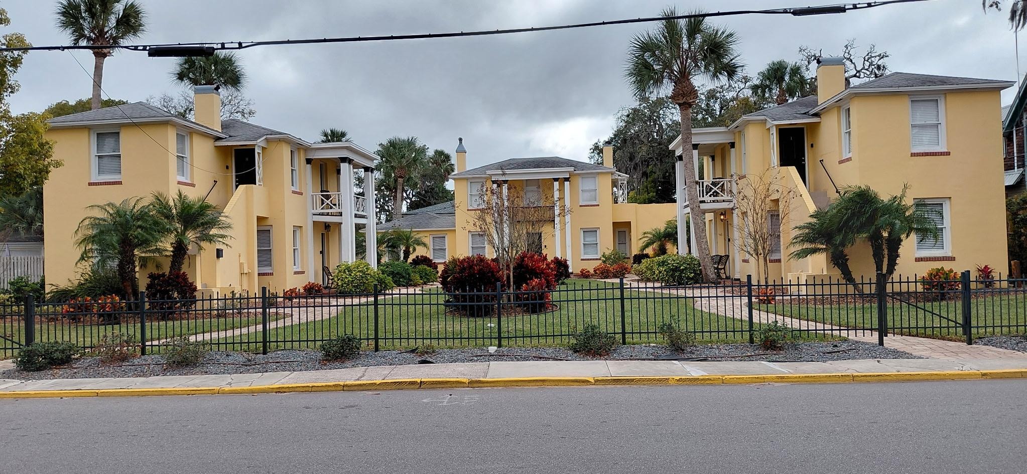 Awesomely maintained place. Parking spaces are located at the back of the middle apartment.