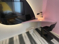 Der Sitzbereich eines superior design Doppelzimmers.