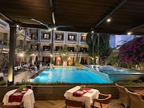 Beautiful dining room with pool view.