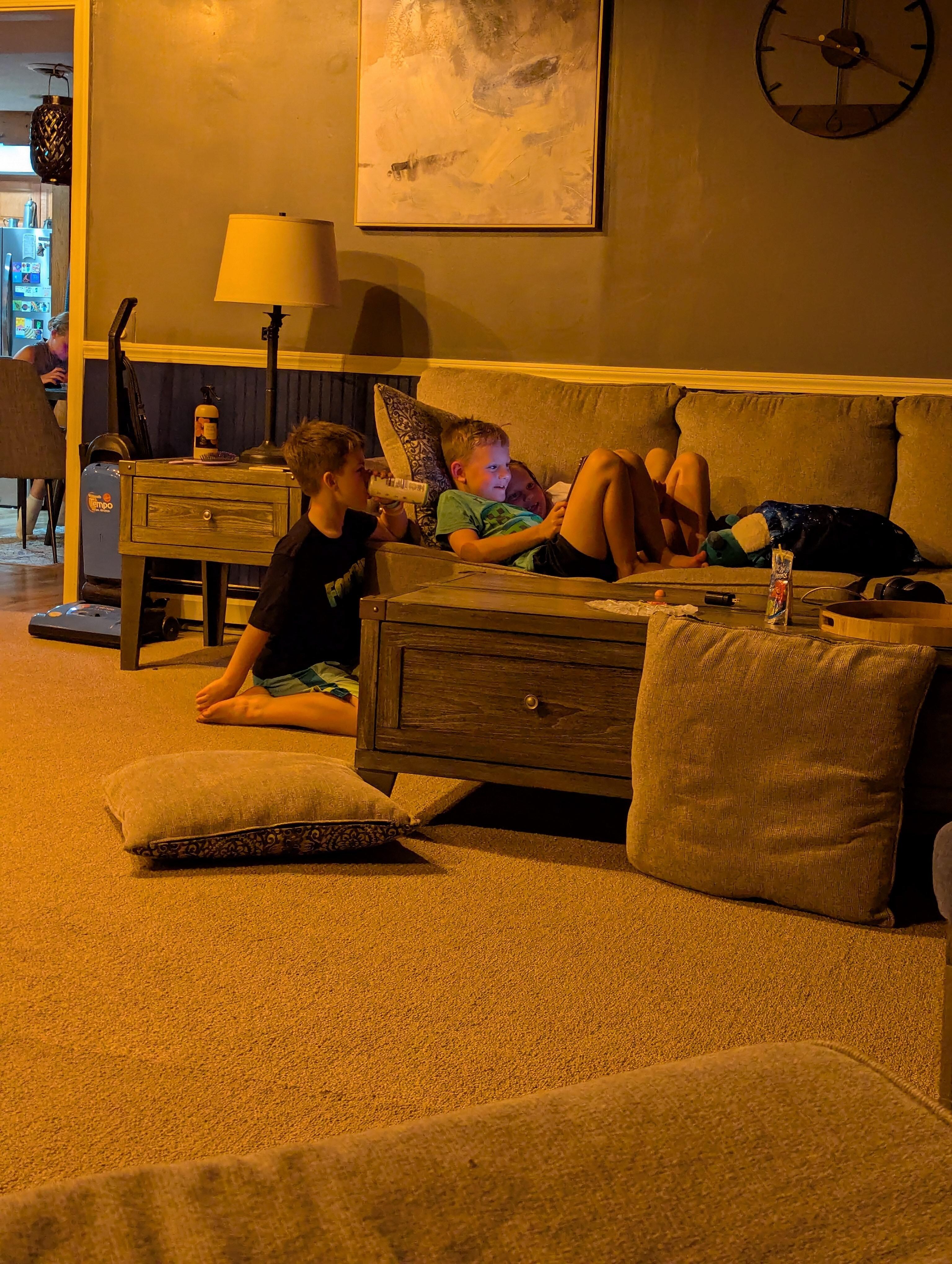 Kids chilling at the end of a day of fun at the lake 