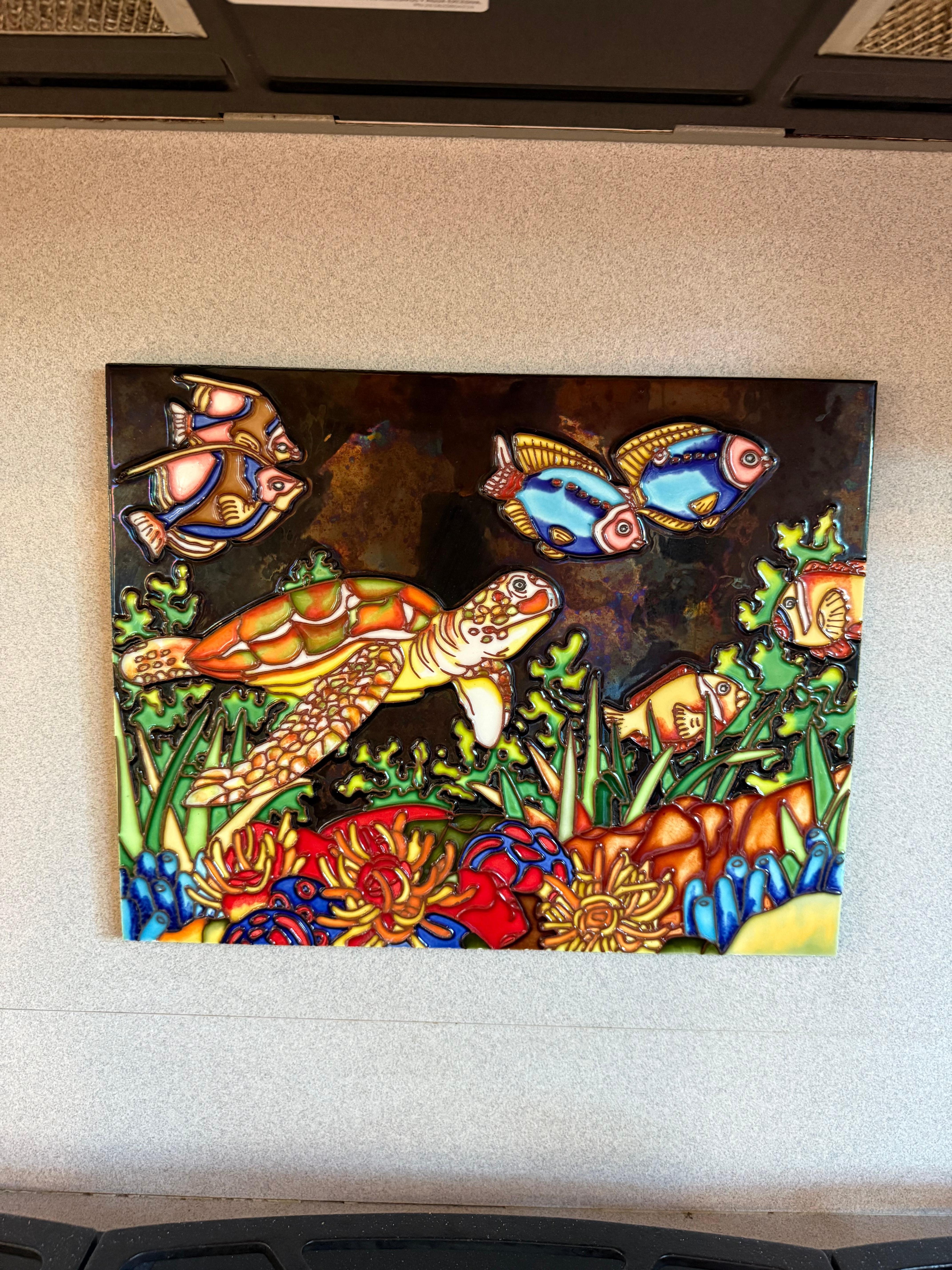 Ceramic over stove, nice touch. 