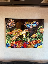 Ceramic over stove, nice touch.