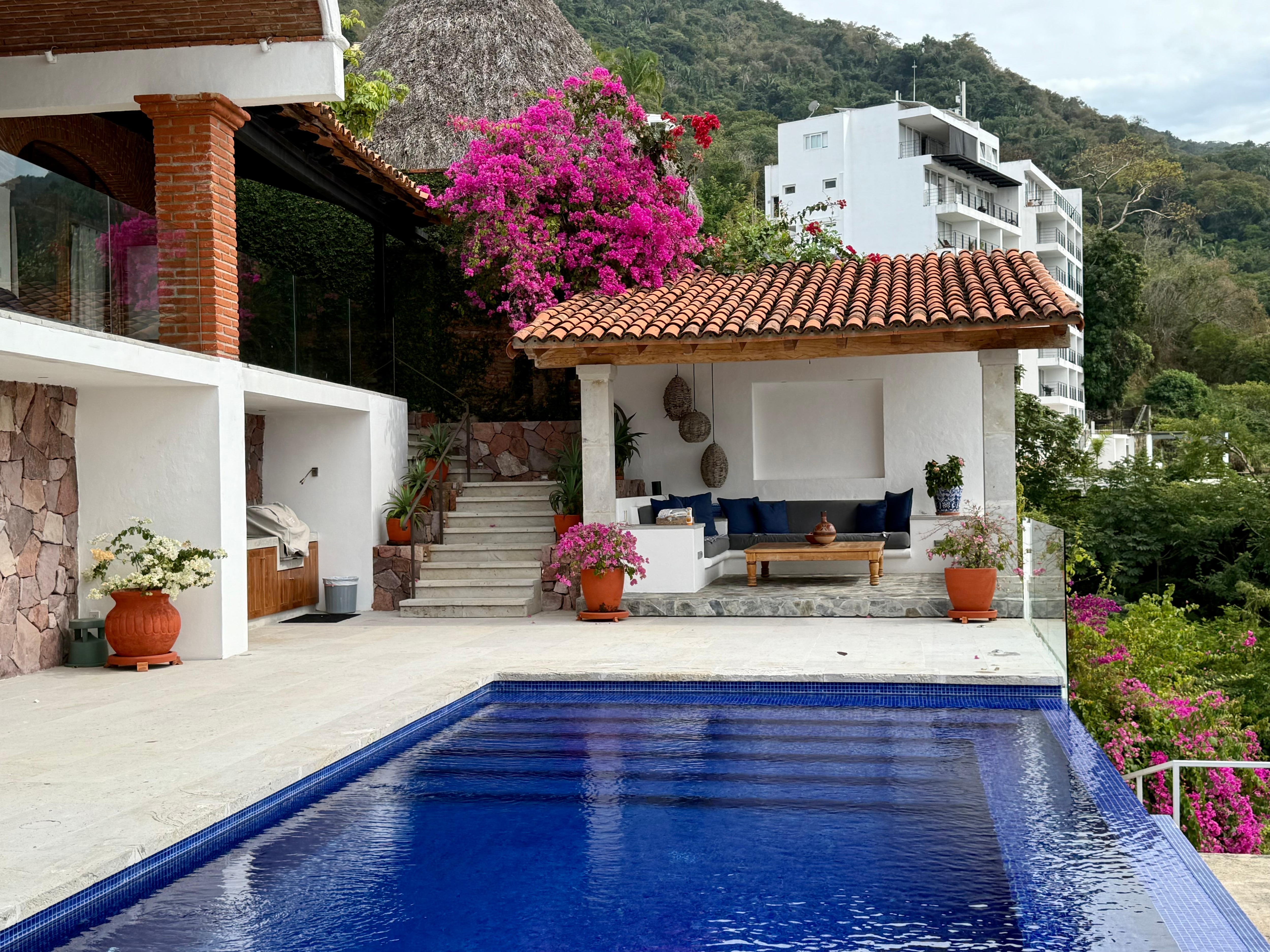 The infinity pool with the cabana