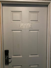 The written number on the door showed the level of disarray of this property