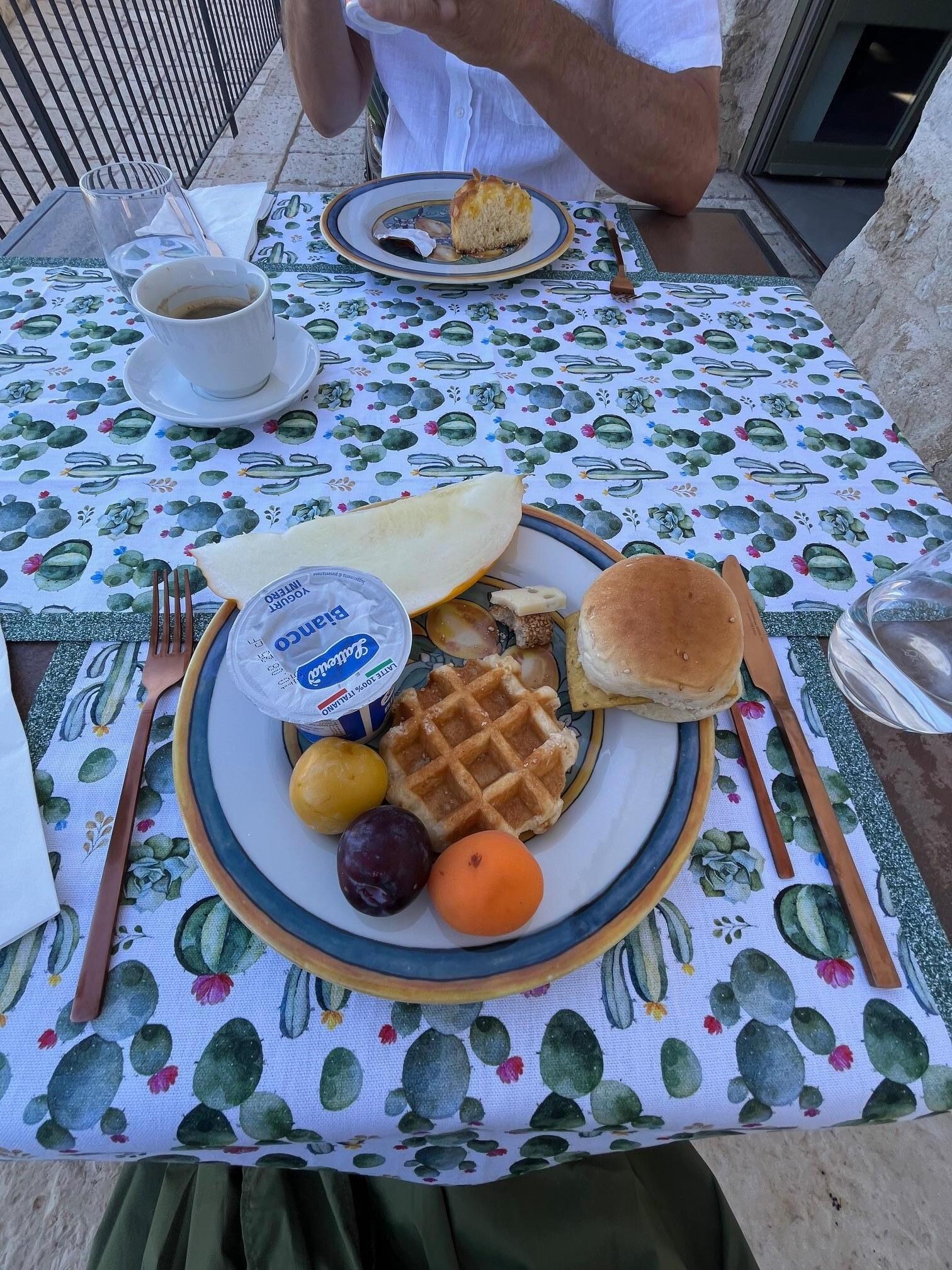 Beautifully laid breakfast table with a small selection of the breakfast offerings