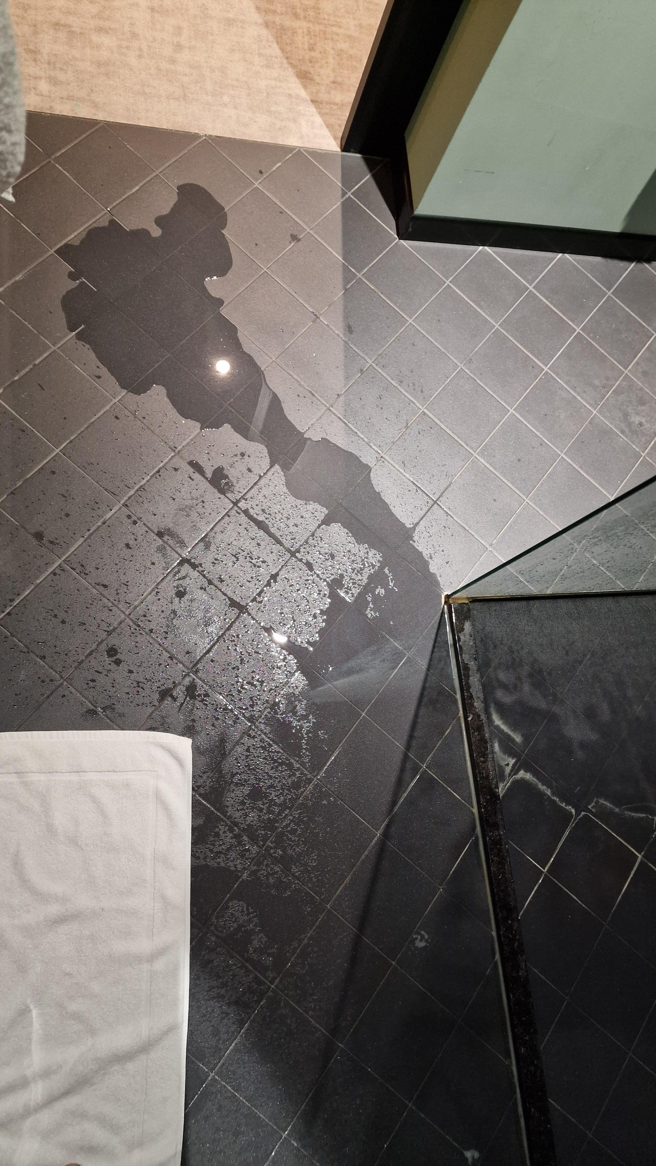 Shower drain installed so poorly it floods the whole bathroom