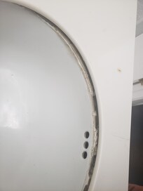 Shower and sinks falling apart.