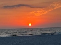 Sunset at beach across the street