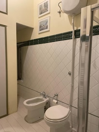 Personal/private bathroom fit with a bidet.