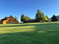 That’s the barn to the left  of the house