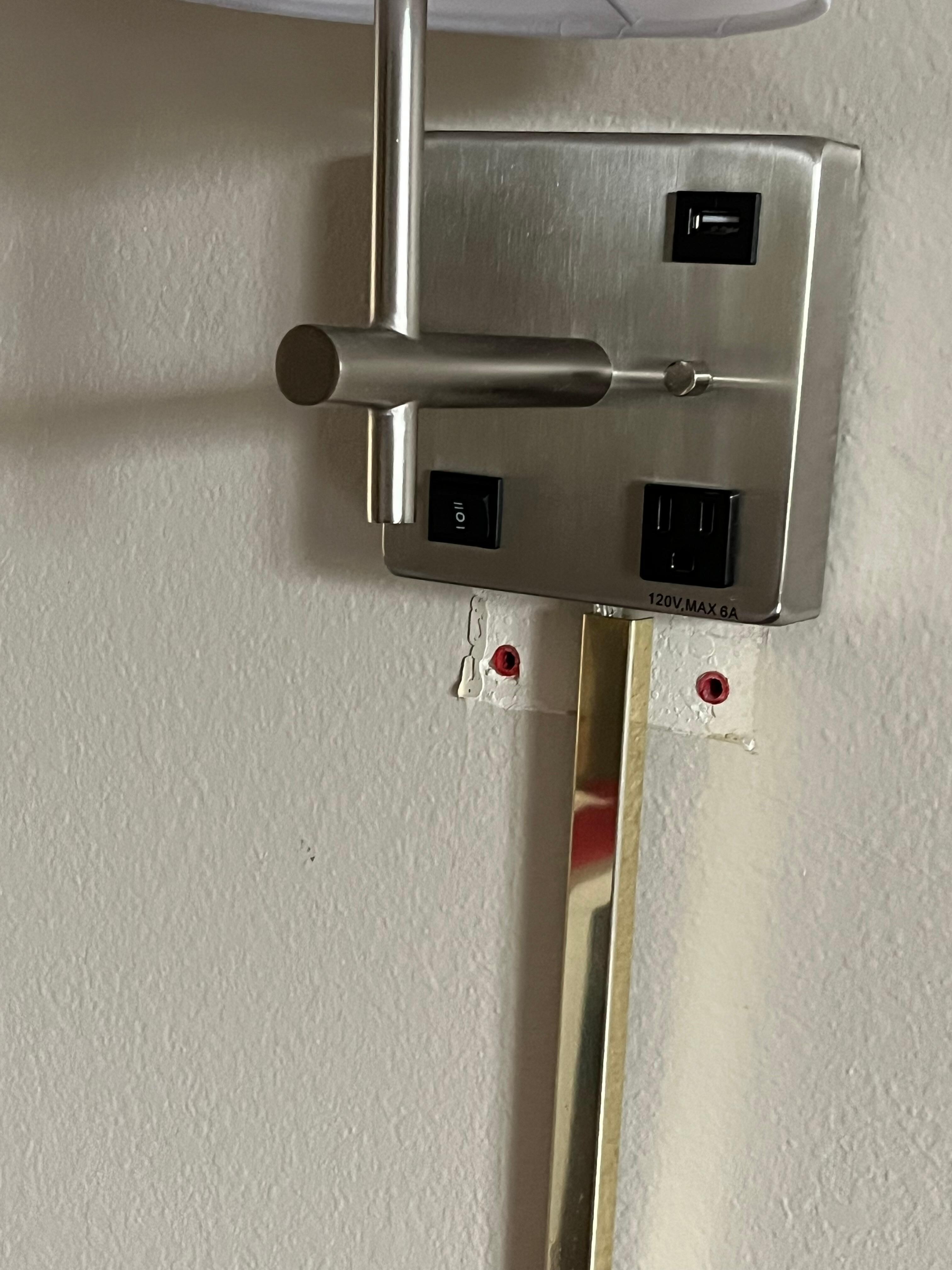 Light fixture installed and old location not repaired 