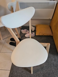 Broken dining chairs.