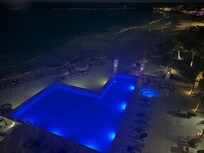 Pool from my room with the ocean