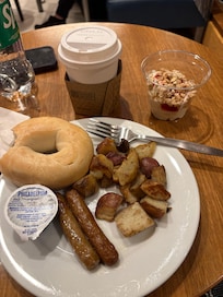 Yogurt bar was my favorite. Tasty potatoes and sausage, bagel and coffee. There was eggs but I don’t eat them.