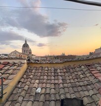 Rooftop patio at sunset.