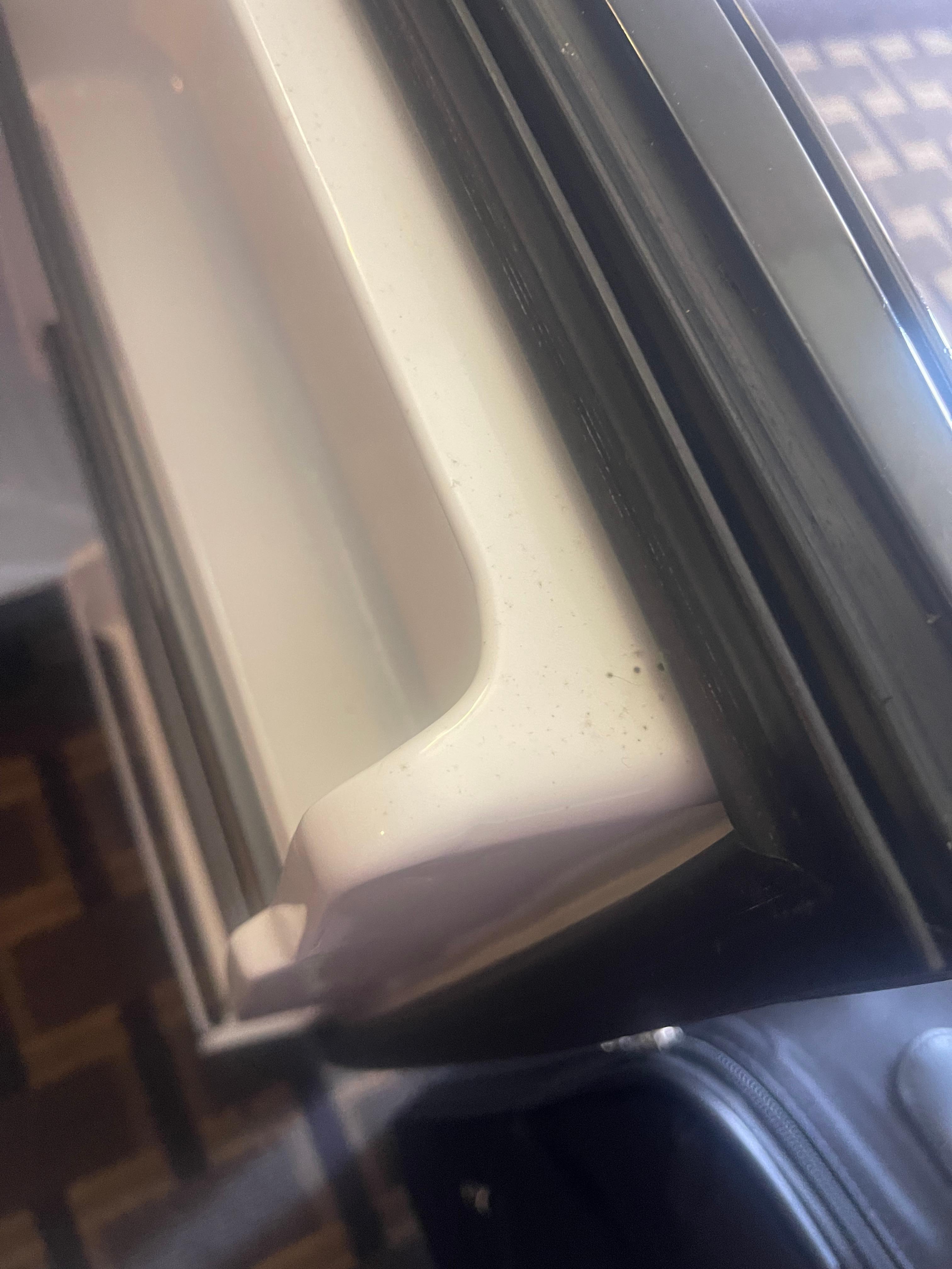 The mold in the refrigerator was on the door and inside.