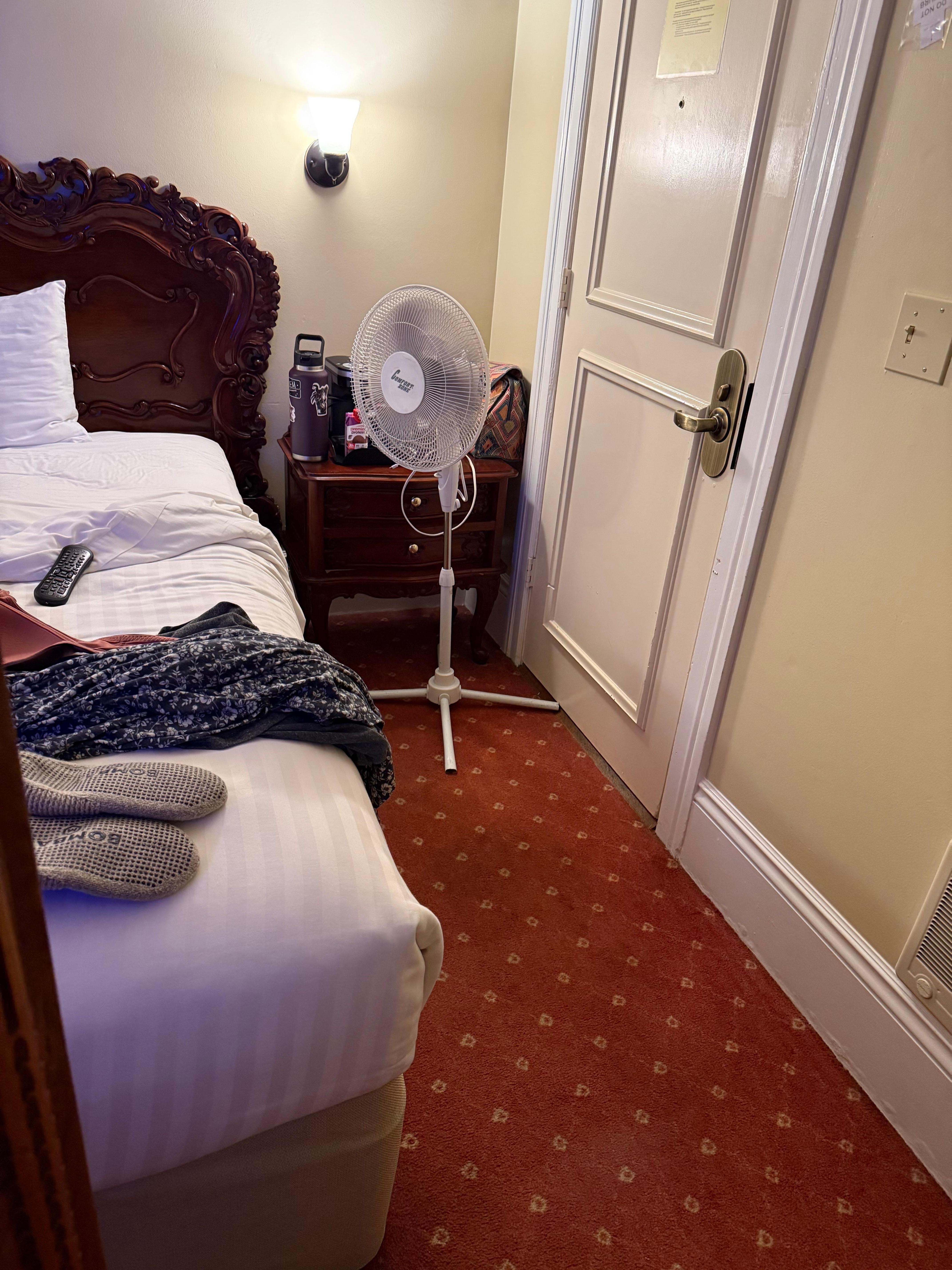 door right up against the bed couldn't even bring in luggage cart with our items on it