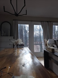 Sunset streaming in thru the floor to ceiling windows