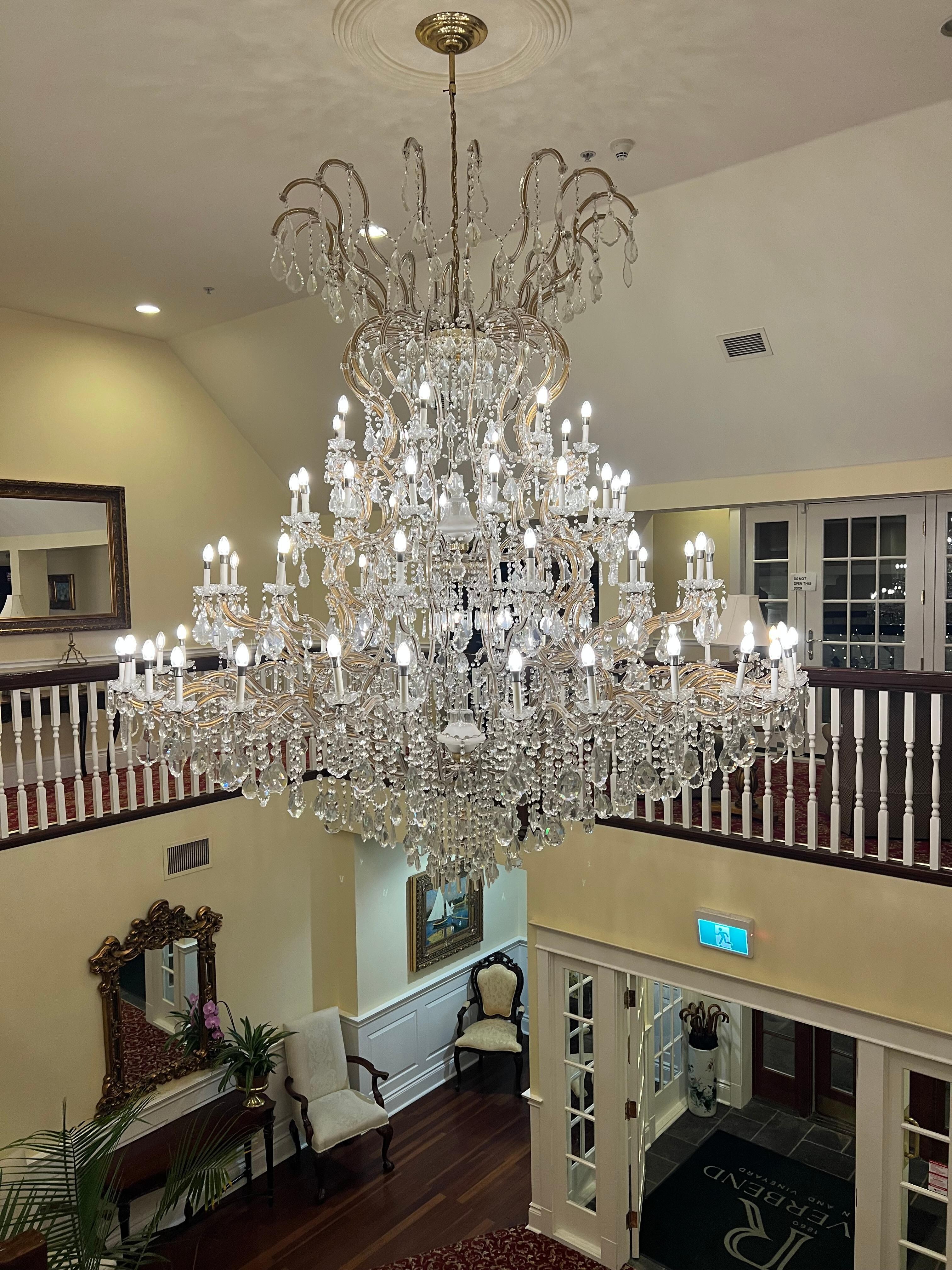 Chandelier overhanging lobby 