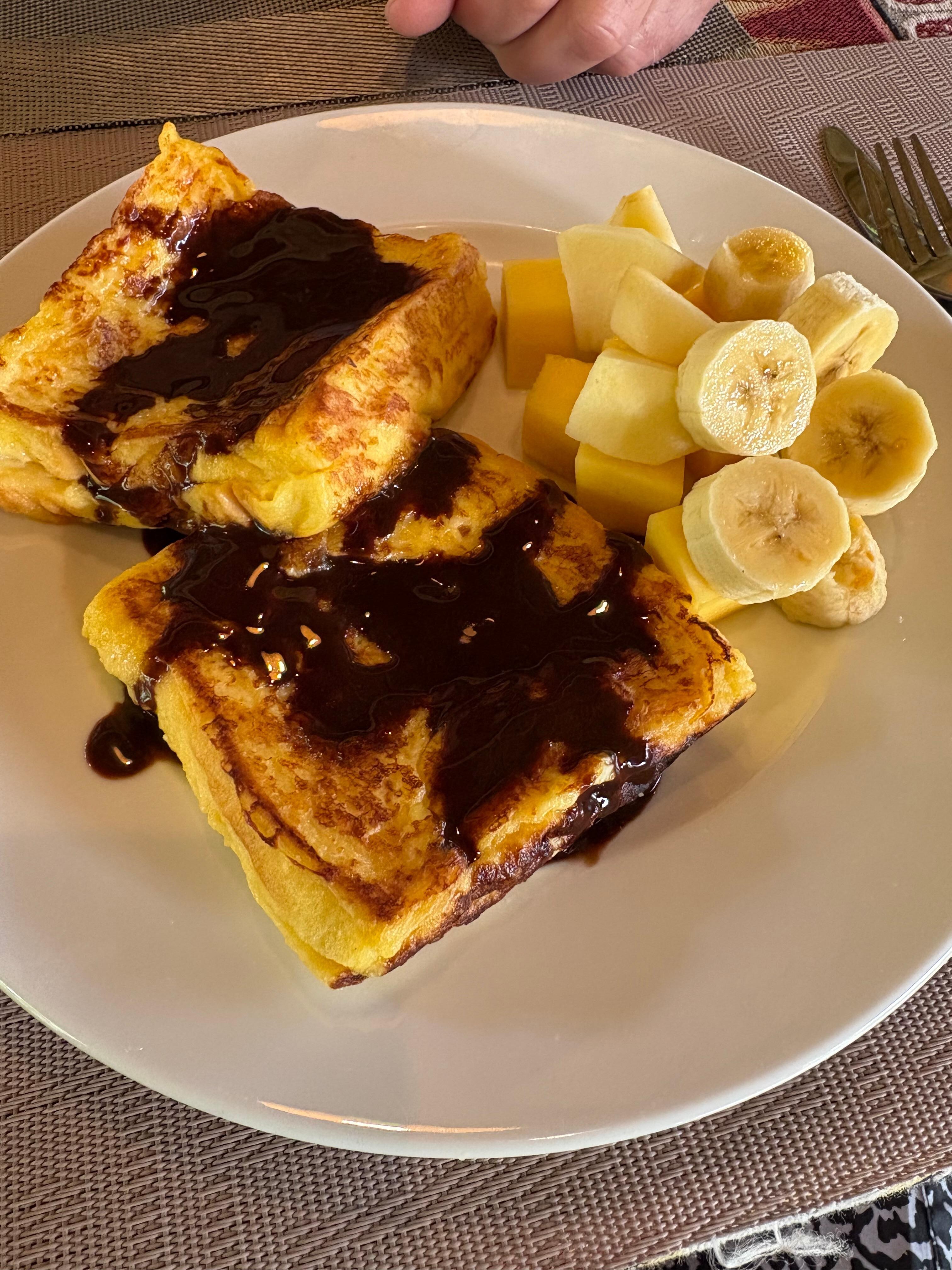 French toast with fresh fruit, I added chocolate sauce. 