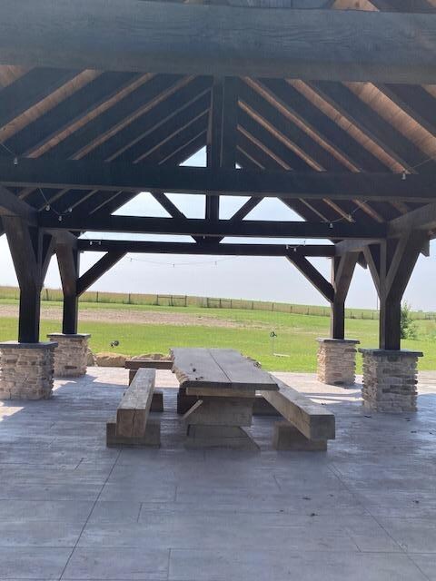 The table in the shelter seats about 12 people, great place to eat dinner by the lake.