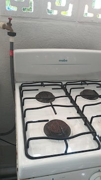 The stove has not been cleaned in years.