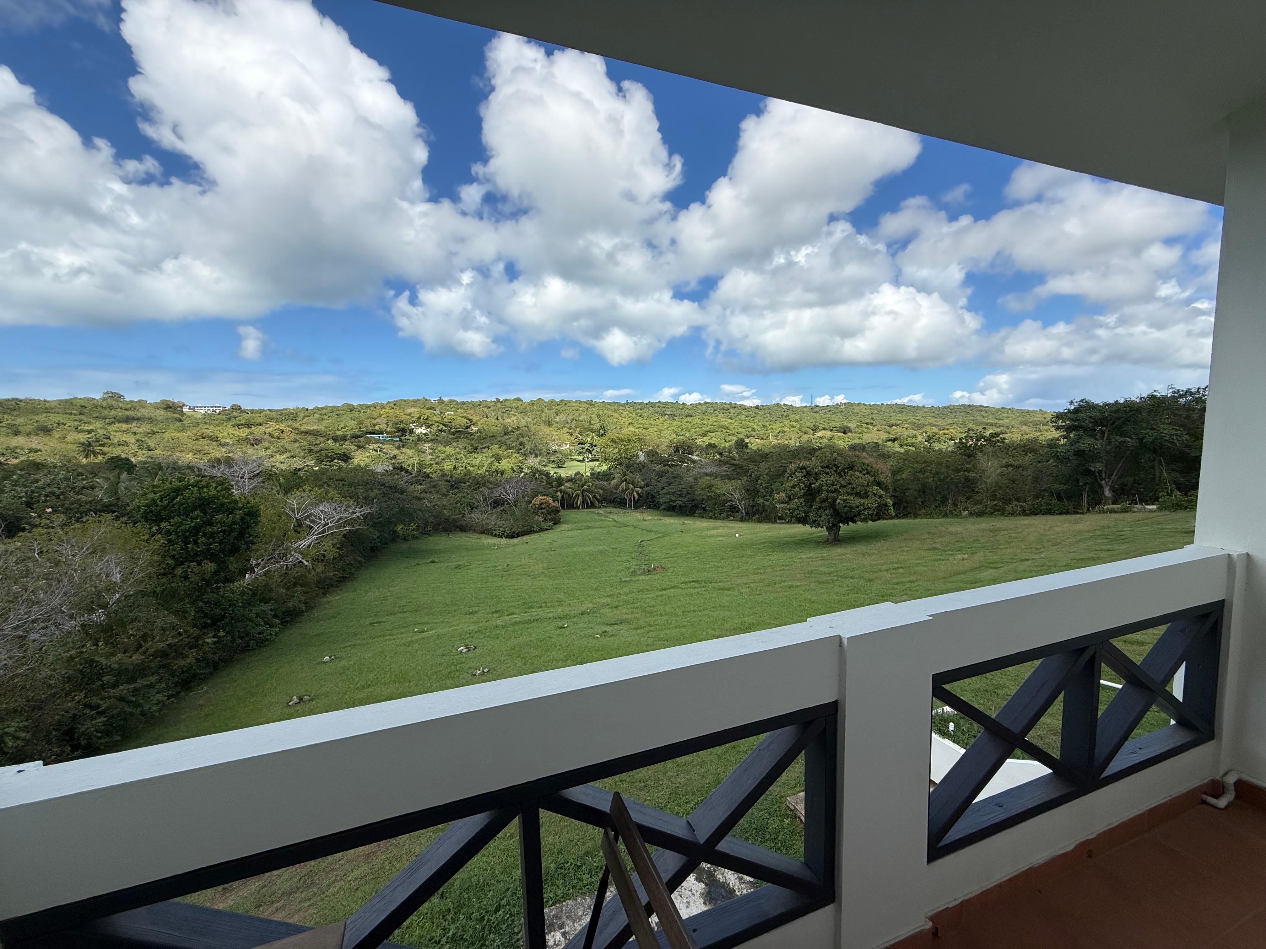 View from room balcony. Suggest the rooms facing the back.