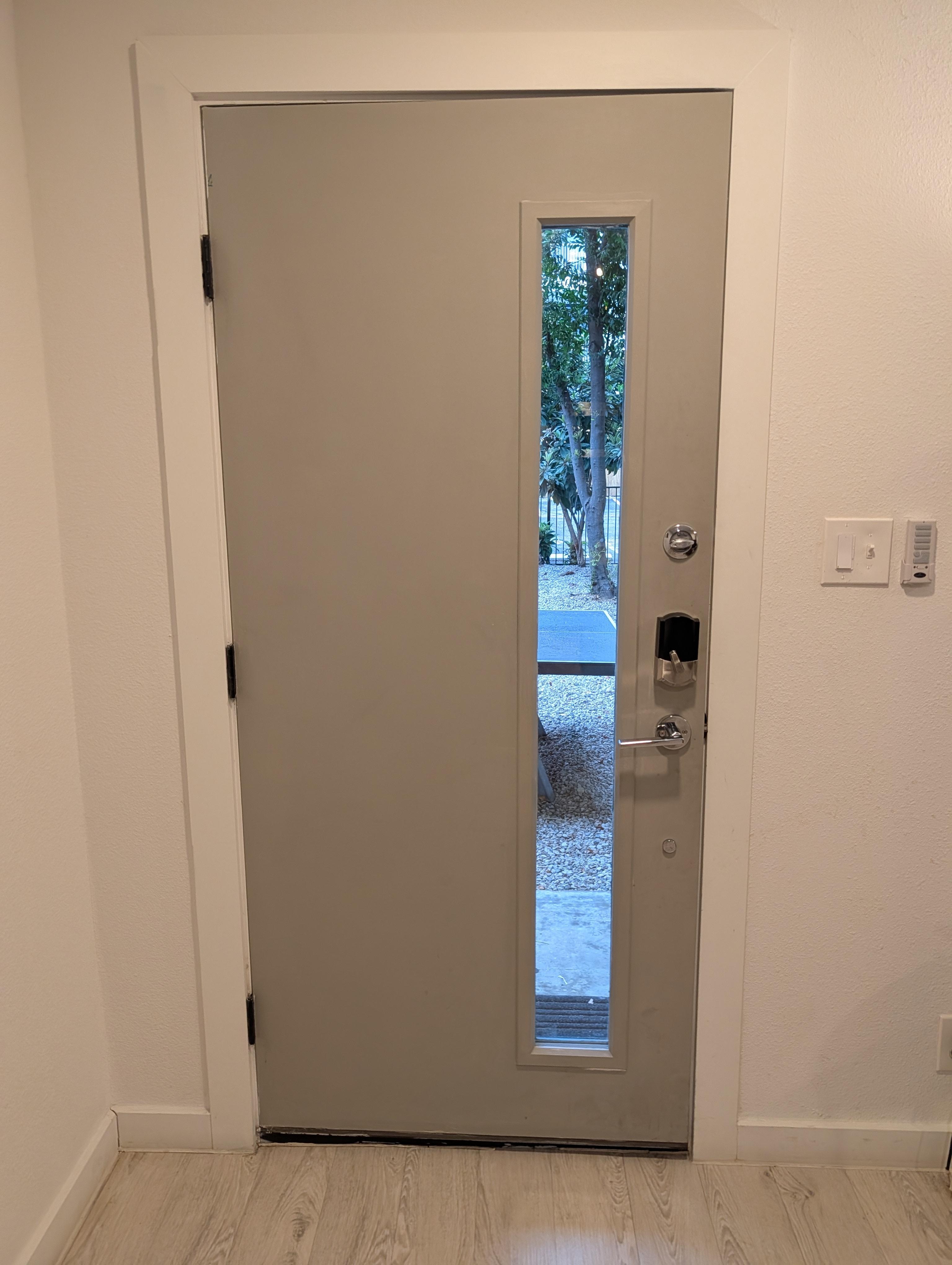 Front door from inside. Some other units have blinds.