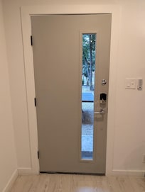 Front door from inside. Some other units have blinds.