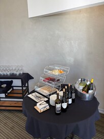 Happy hour- free to pour for yourself. Cheese, fruits, and crackers.