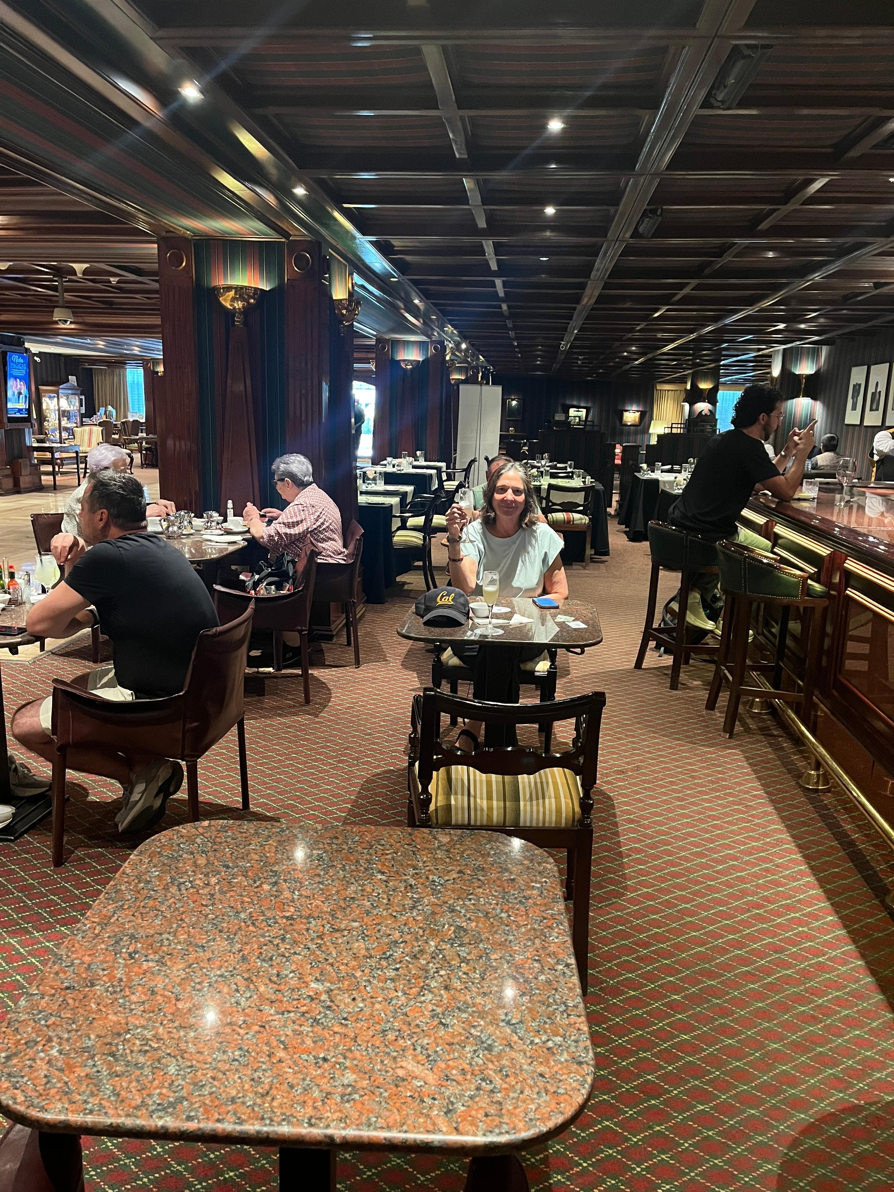 My wife Lisa enjoying complimentary welcome pisco sour drink. 