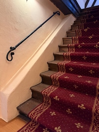 They have elevator to 2nd floor but then to top (3rd floor is stairs) after elevator to 2nd floor. We stayed in the attic room with windows. 1300 AD building.