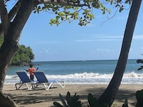Boy dancing on the beach.