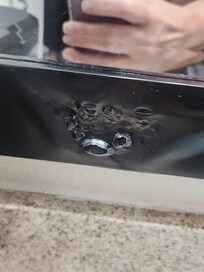 The corner of the bathroom mirror