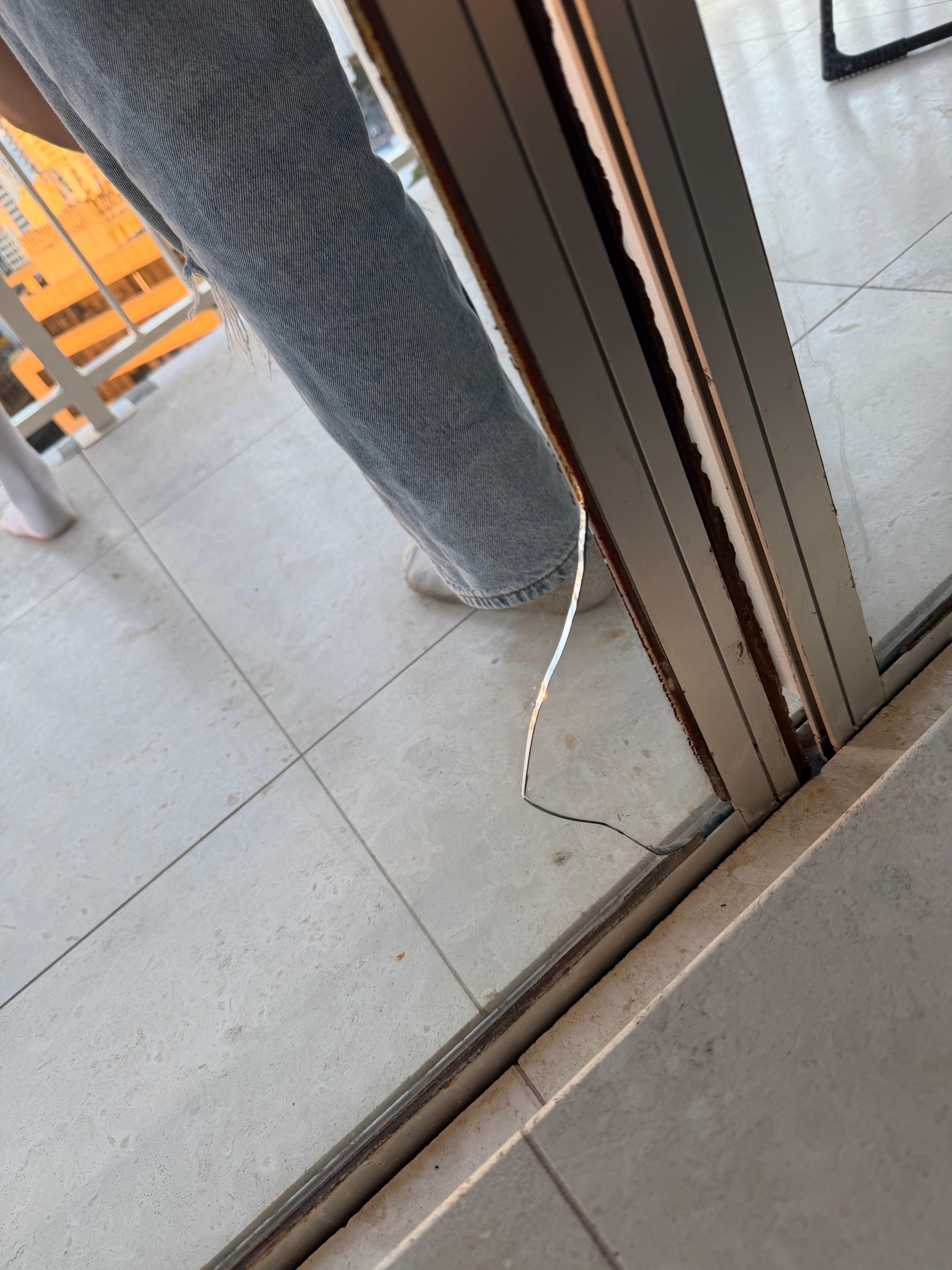 Cracked glass on balcony door