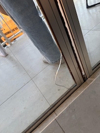 Cracked glass on balcony door