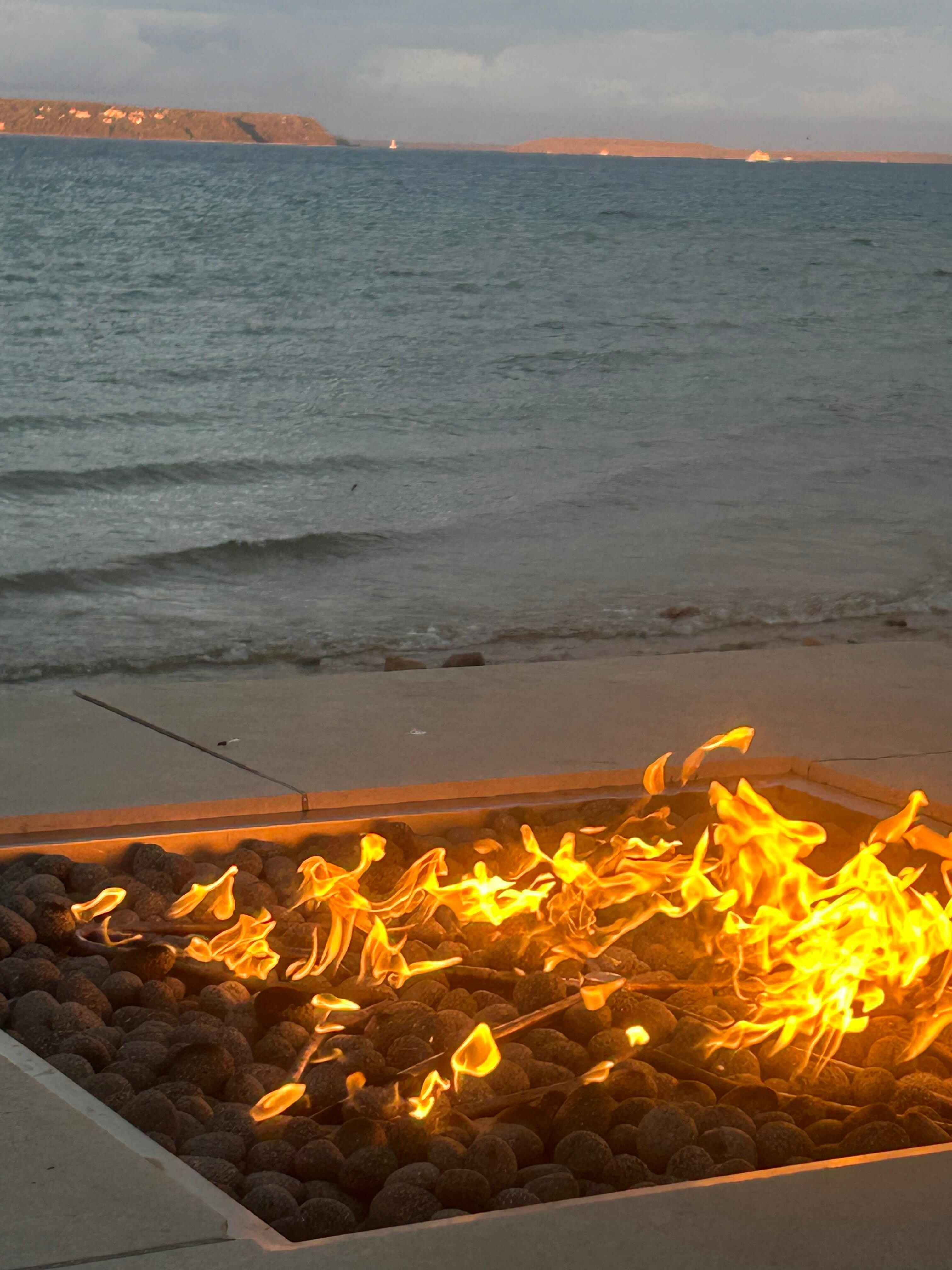 four Sunset over the fire looking towards Mackinac Island