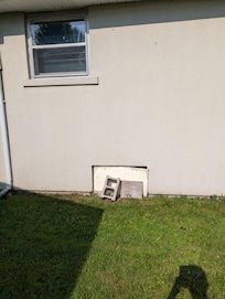 Basement windows are strangely covered up
