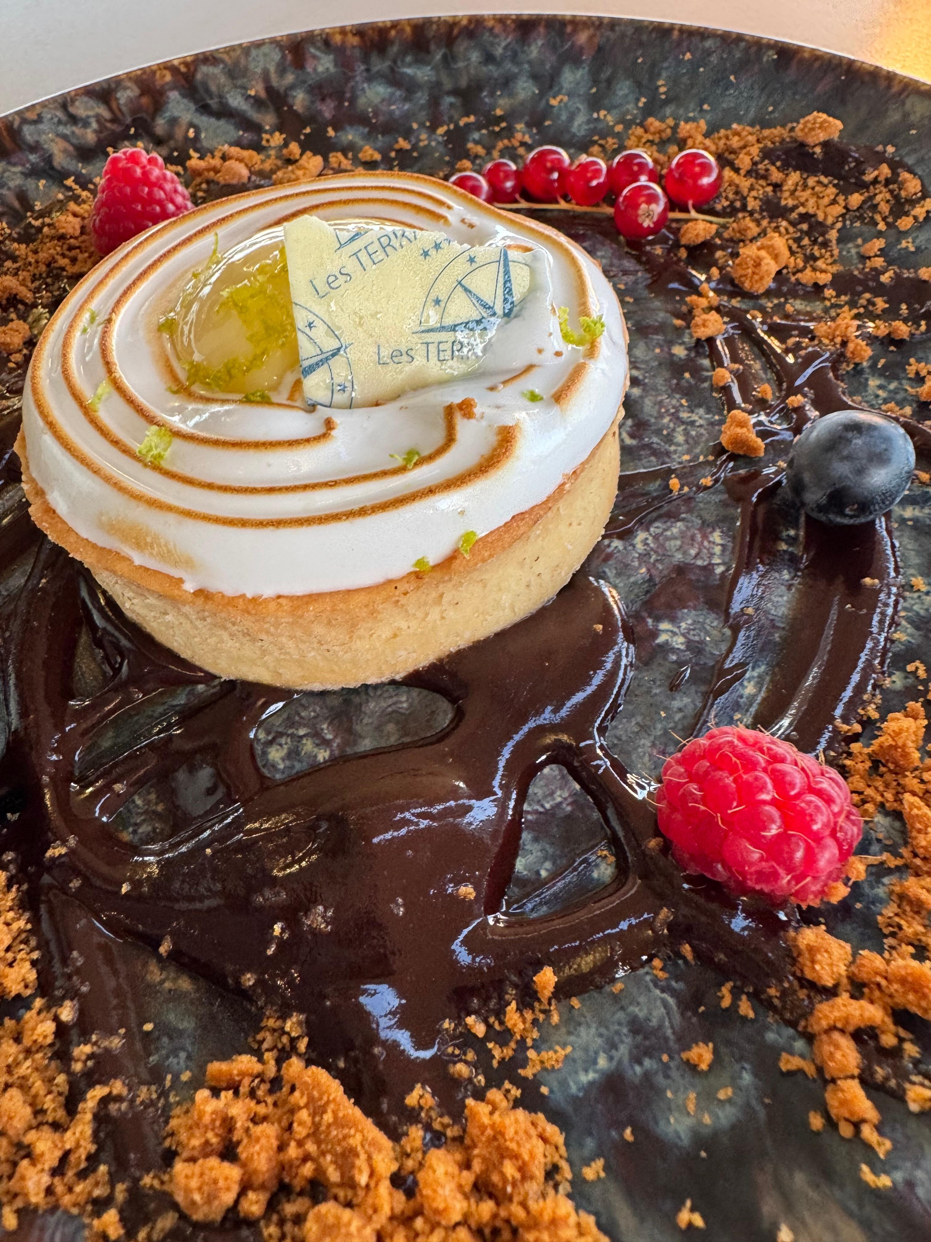 In your best effort at speaking french, ask for the tarte au citron sur un lit de chocolat