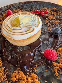 In your best effort at speaking french, ask for the tarte au citron sur un lit de chocolat