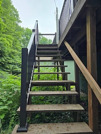 Stairs up to the front door.