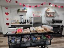 Breakfast included with stay. Bagels, muffins, granola bars, burritos, pastries, juice, coffee, milk, etc.