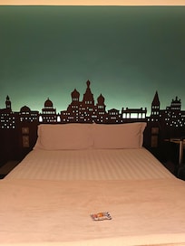 Very comfortable bed in a charming room.