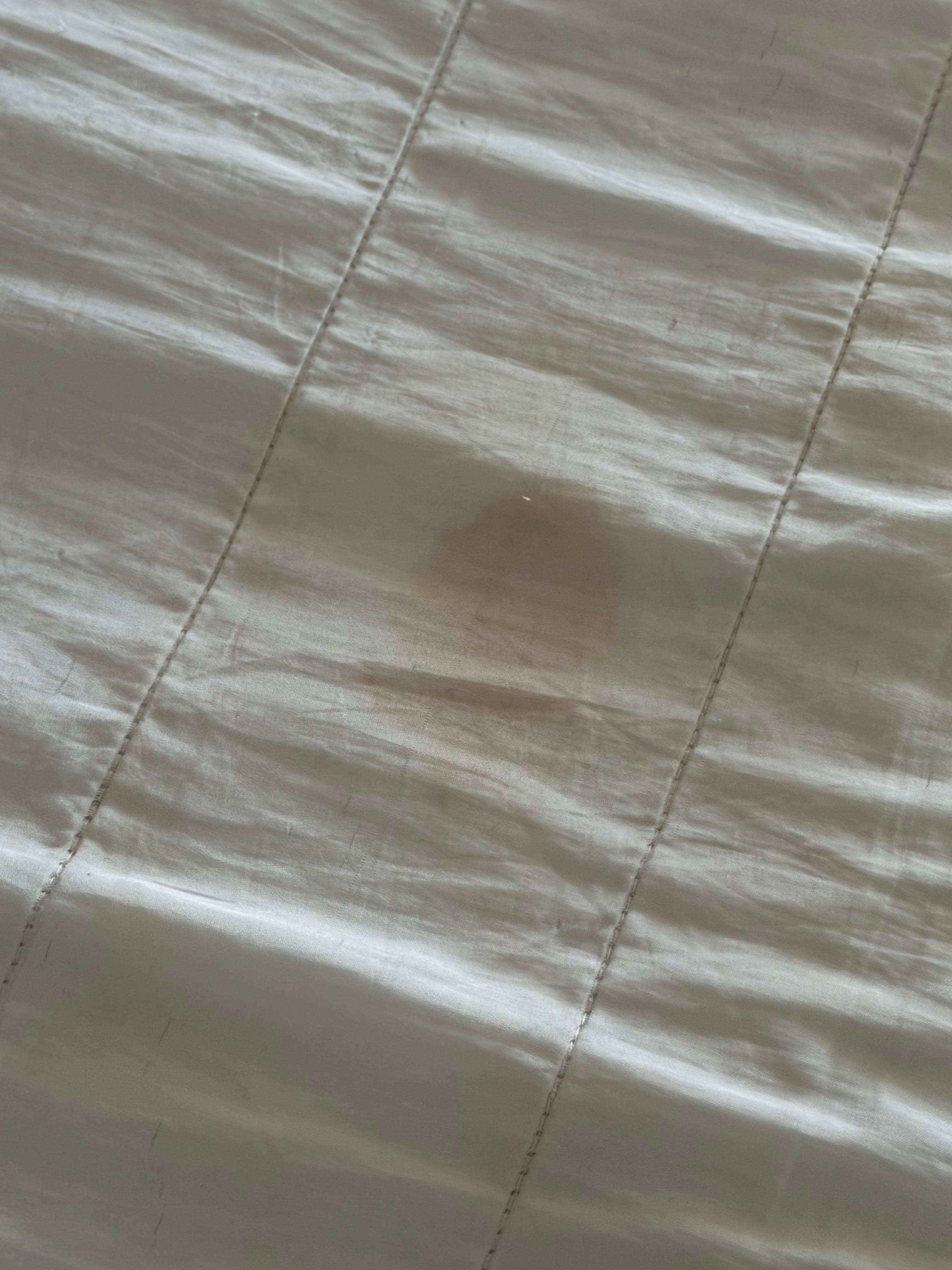 Different blood stains on the mattress cover