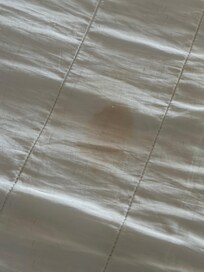 Different blood stains on the mattress cover