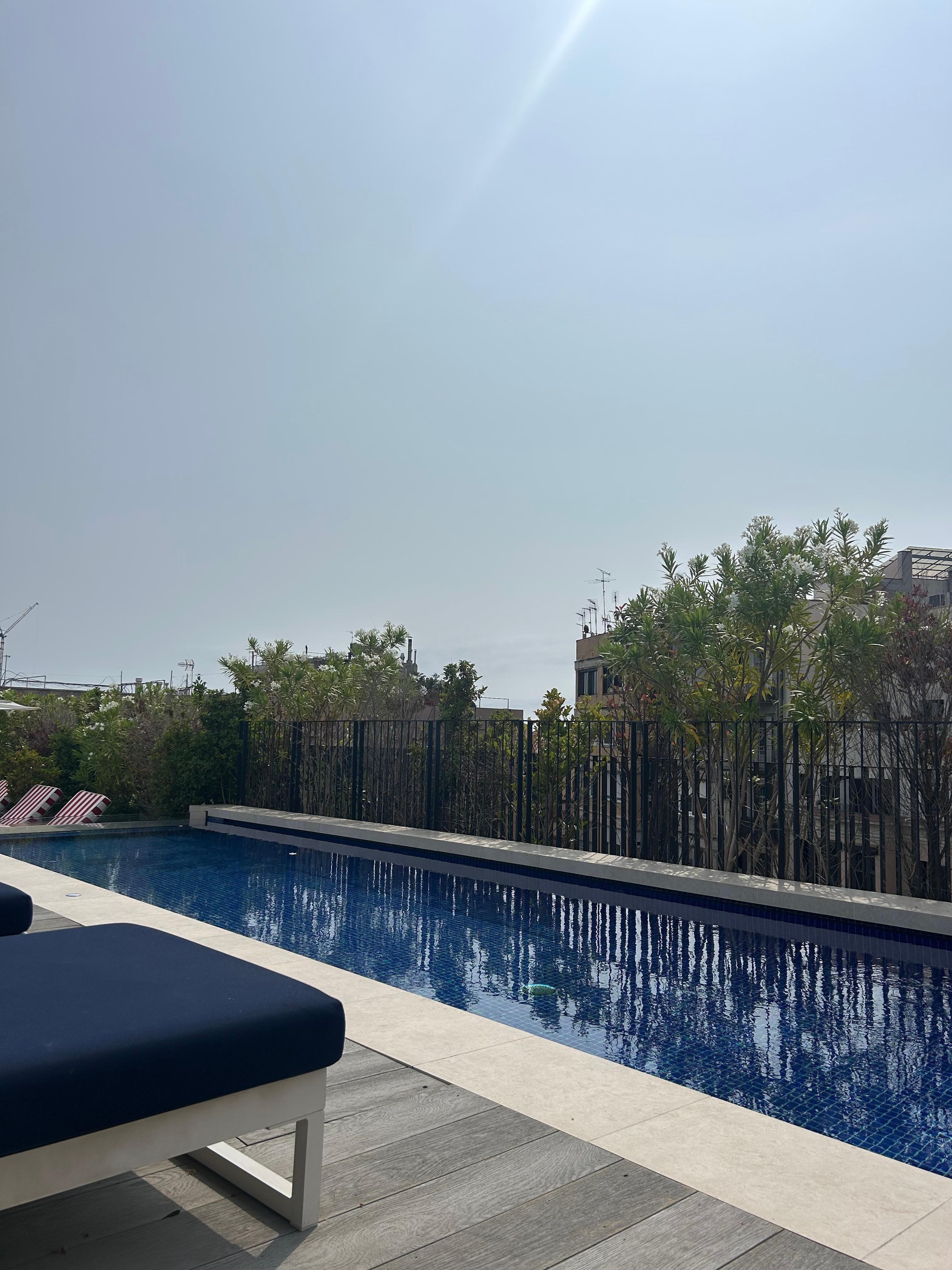 Relaxing by the pool on top of the hotel. 