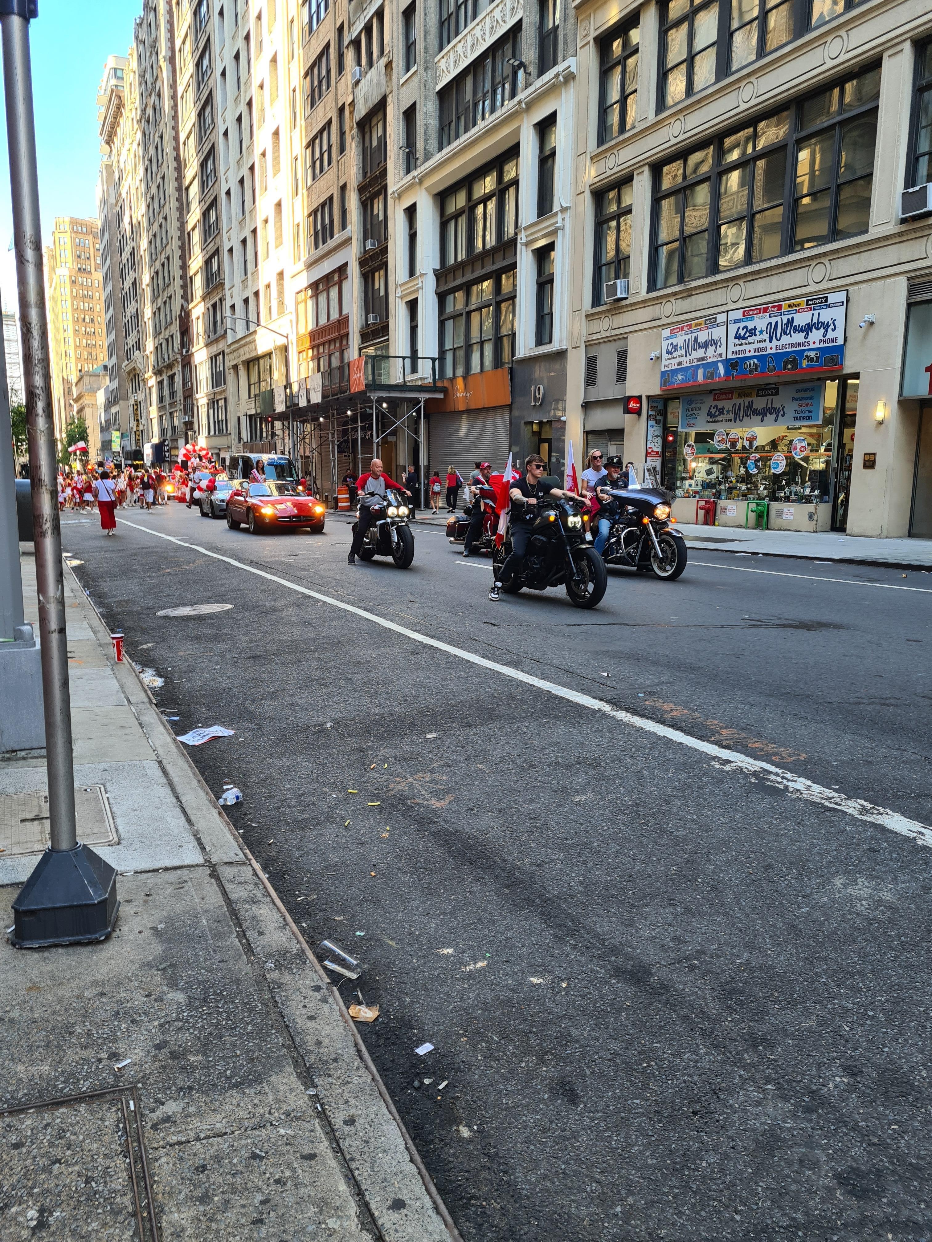 Outside hotel, there was a parade on